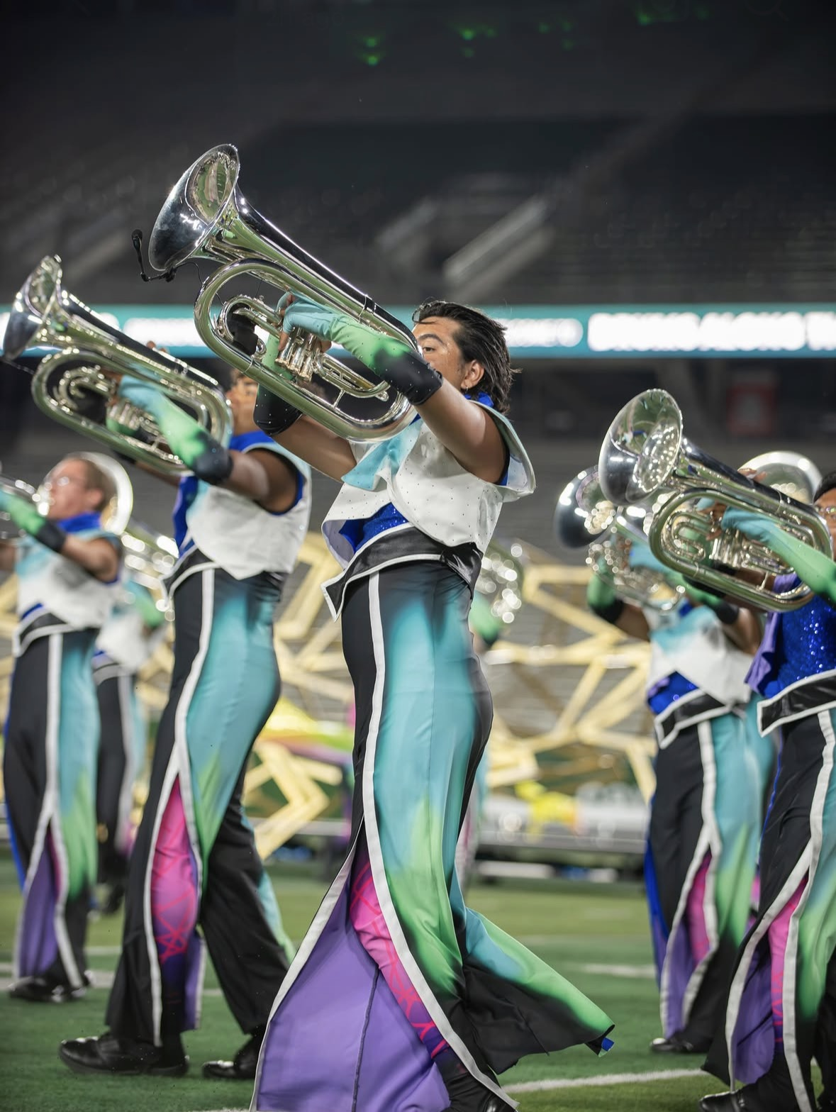 action shot of seb performing with the Blue Devils
