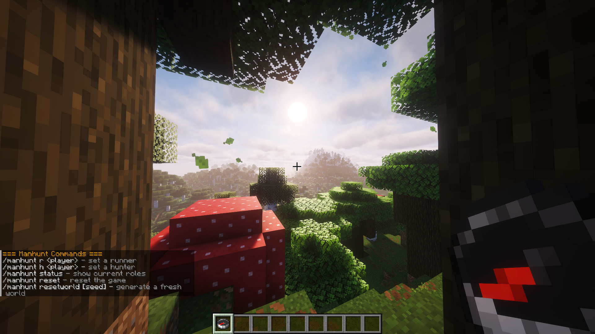 Minecraft screen showing the Manhunt plugin commands